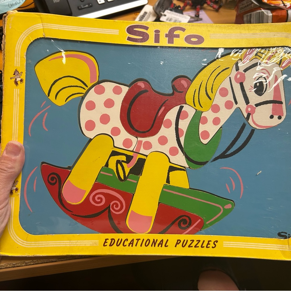Yellow and Red Sliding Puzzle Toy with Horse Design